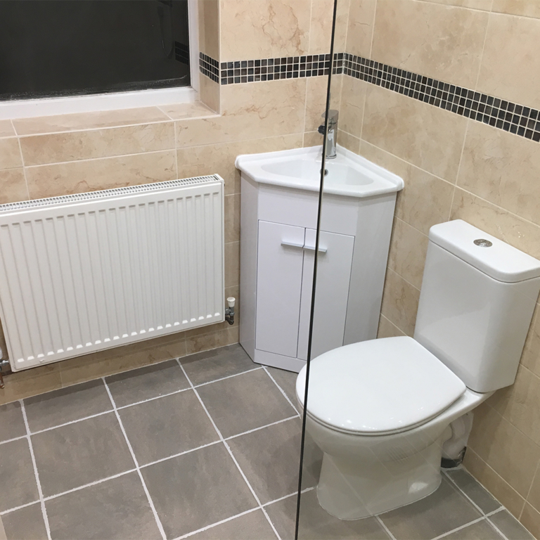Full Wetroom with vanity, toilet and tiling